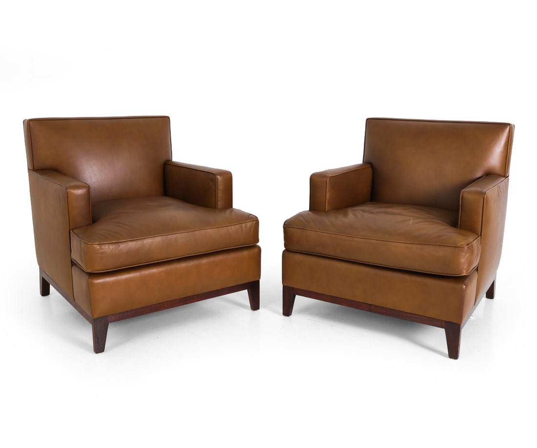 PAIR OF SHAWN HENDERSON NY LEATHER LOUNGE CHAIRS: Custom upholstered lounge chairs by designer Shawn Henderson, Marked to lining. Dimensions: H 33" x W 27" x D 31" x SH 16"