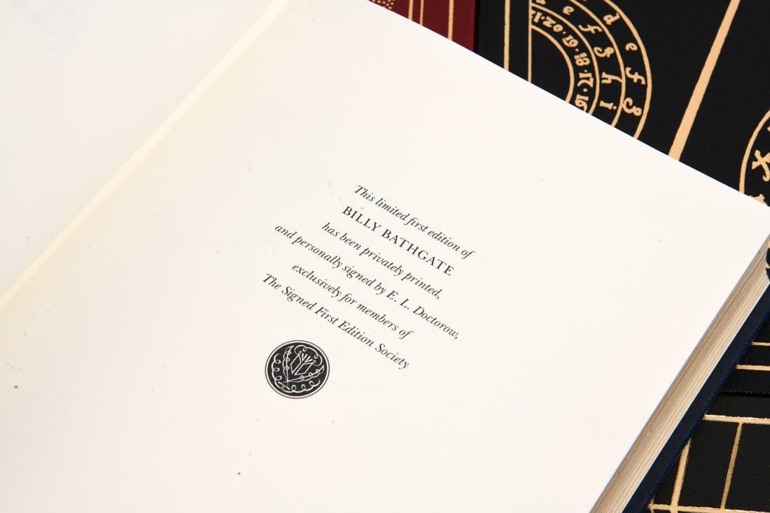 GROUPING SIGNED FIRST EDITION LEATHER BOUND BOOKS - 19