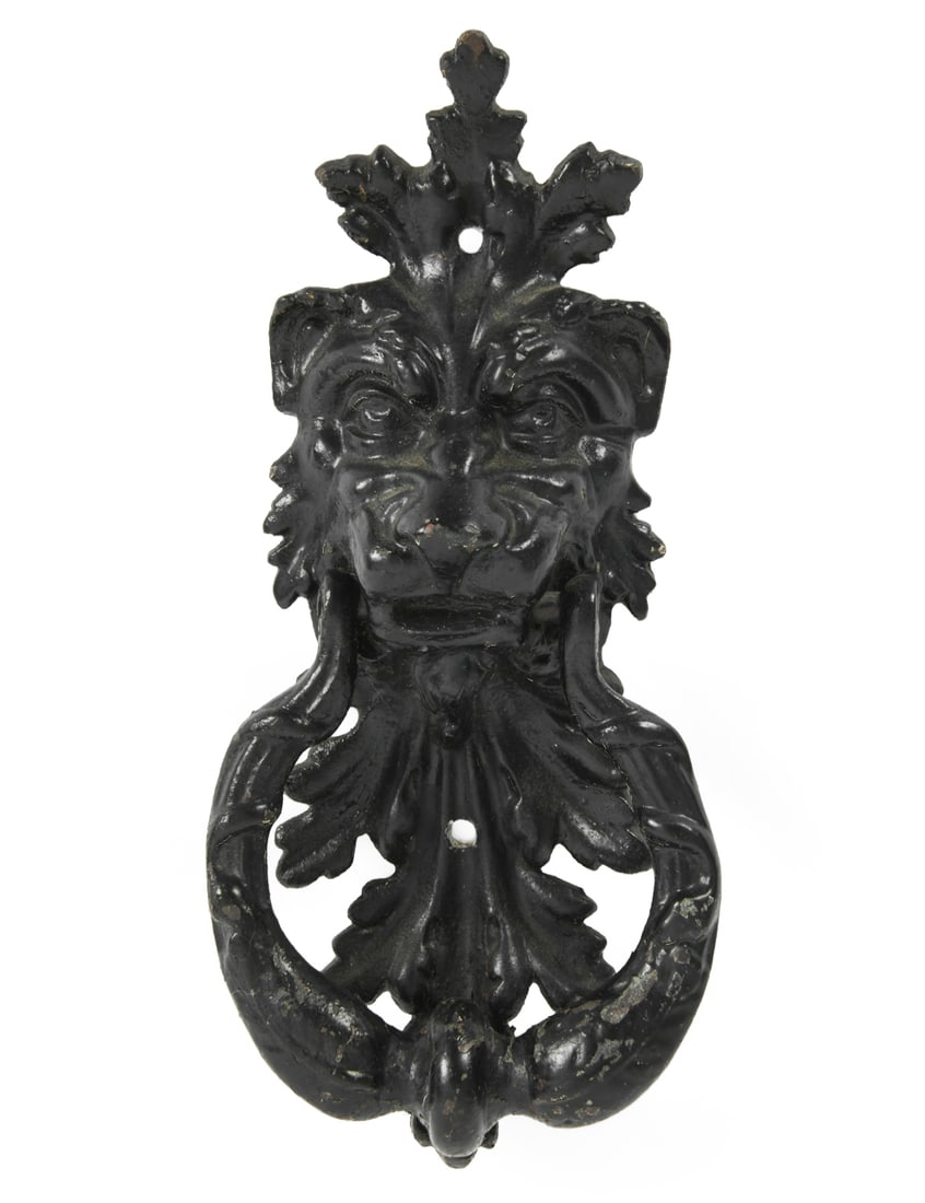 VICTORIAN IRON LION'S HEAD DOOR KNOCKER: Cast metal door knocker in black finish. late 19th c. Dimensions: H 11" x W 5.25" x D 2.25". Condition: Scuffs and scratches, small losses to finish. Wear consistent with age and use.