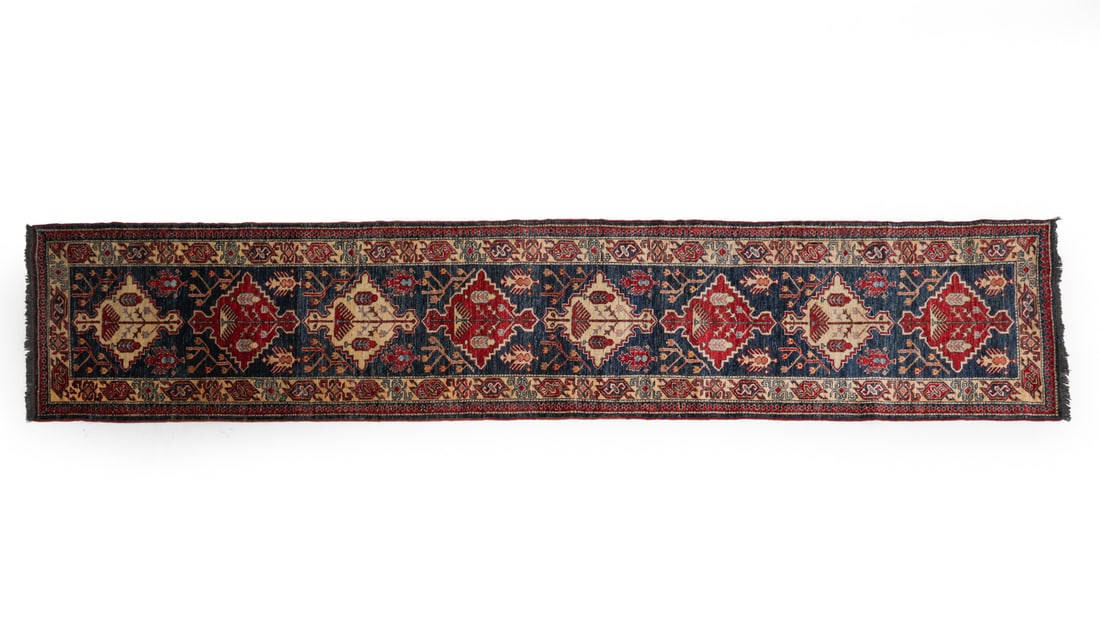 CAUCASIAN KAZAK RUNNER RUG: Apparently unmarked. Dimensions: L 159" x W 33" Condition: Some sun fading. Odor present. Minor loss of pile.