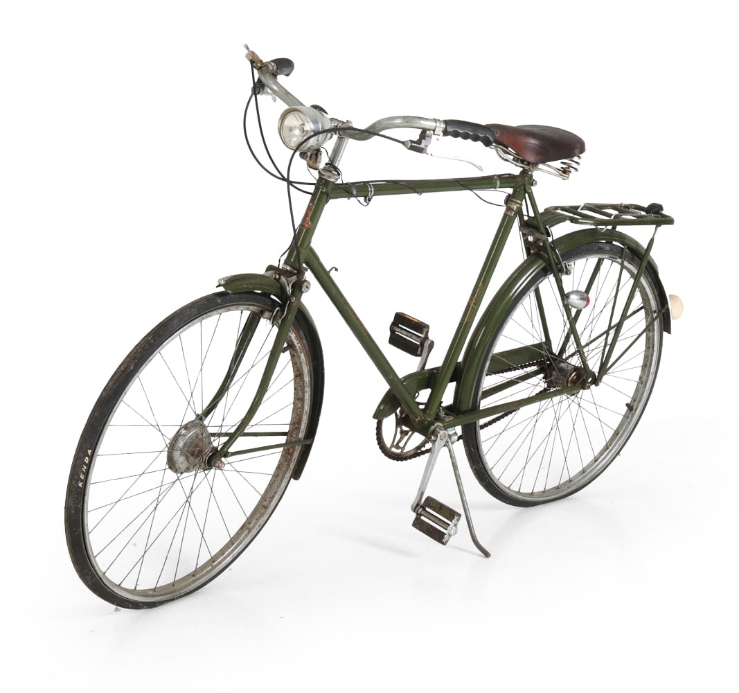 RALEIGH SUPERBE CRUISER BICYCLE C. 1960S: Marked to front. Equipped with headlight and luggage rack. England, circa 1960s. Dimensions: H 36.5" x W 21" x D 66.5". Condition: Spots of rust and oxidation. Surface soiling. Wear consistent with