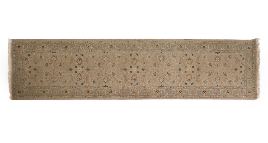 TURKISH OUSHAK STYLE WOOL HAND-KNOTED RUG: The rug features a traditional all-over floral & geometric pattern with a central field and a coordinating border. 20th Century. Dimensions: L 145" x W 37.5" Condition: Some fading throughout. Wear