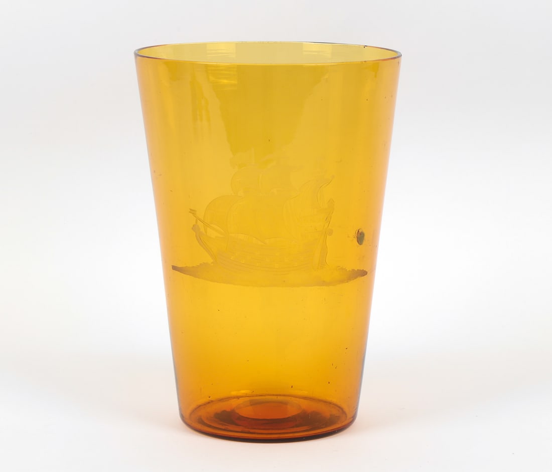 ETCHED SAILING SHIP AMBER GLASS VASE: Etched tall ship motif to side. Apparently unsigned. 20th century. Dimensions: H 12" x Dia. 8.75". Condition: Scuffs and scratches, mostly to underside. Small hole to side with filling. Wear