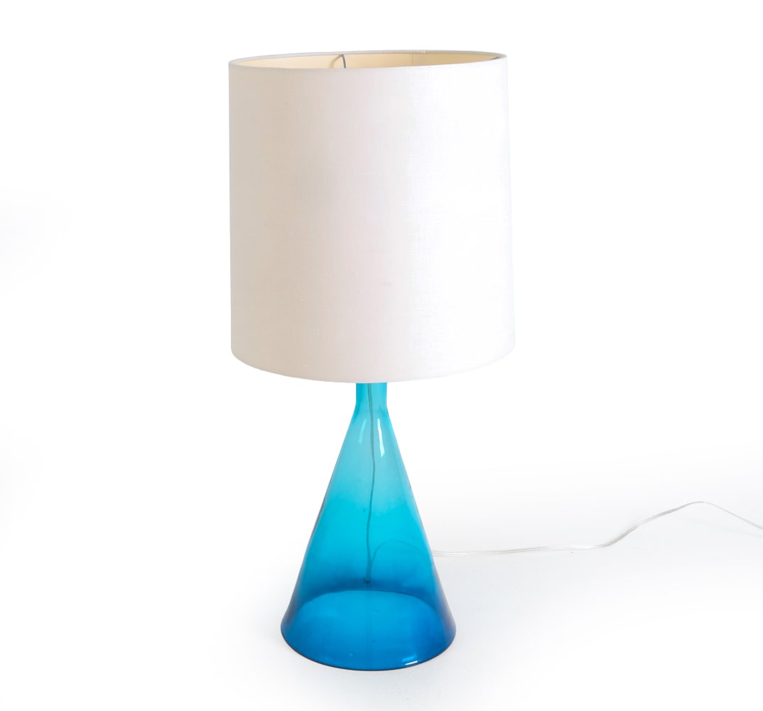 CONTEMPORARY GLASS TABLE LAMP: Glass table lamp in translucent blue tone. Contemporary. Dimensions: Socket is loose, tape holding in place. Wiring untested. Wear consistent with age and use.