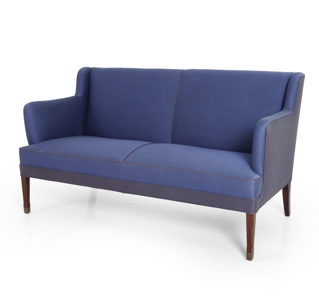 FRITS HENNINGSEN DANISH LOVESEAT C. 1950S: Denmark, circa 1950s. Dimensions: H 32" x W 56" x D 26" x SH 16.25". Condition: Sun fading to upholstery. Wear consistent with age and use. E092