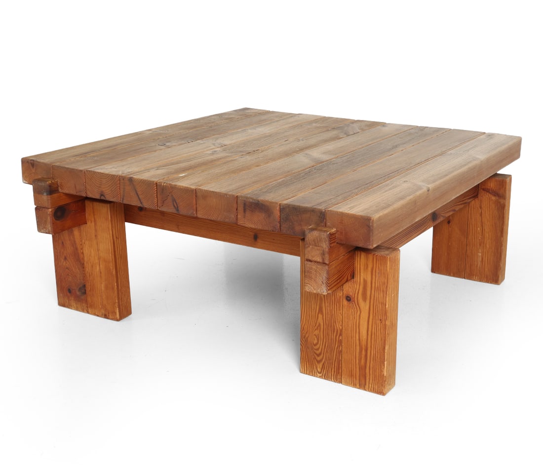STYLE OF FRYDENDAL DANISH PINE COFFEE TABLE 1970S: Denmark, circa 1970s. Dimensions: H 20" x W 47.5" x D 47.5". Condition: Fading to top, wear consistent with age and use, including scuffs and rubs.