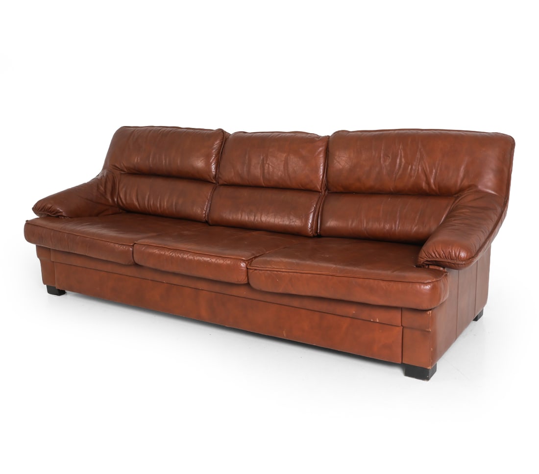 DE SEDE STYLE DANISH LEATHER SOFA C. 1960S: Dimensions: H 32.5" x W 85" x D 33.5" x SH 15.25". Condition: Scratches and small perforations to leather. Wear consistent with age and use. E083