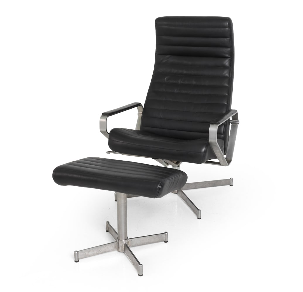 BOLIA "VITESSE" LEATHER & CHROME CHAIR W OTTOMAN: Black leather upholstery. Chromed frame. 20th century. Dimensions: Chair H 41" x W 25.5" x D 27.5" x SH 17.5". Ottoman H 16.5" x W 19" x D 14.5". Condition: Fading and rubs to leather. Scuffs to frame