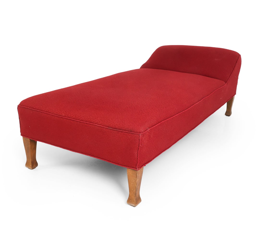 SCANDINAVIAN CHAISE LOUNGE DAYBED C. 1950S: Dimensions: H 23.5" x W 77" x D 34" x SH 18". Condition: Reupholstered, Slight fading and discolored spots. Scuffs to legs. Wear consistent with age and use.
