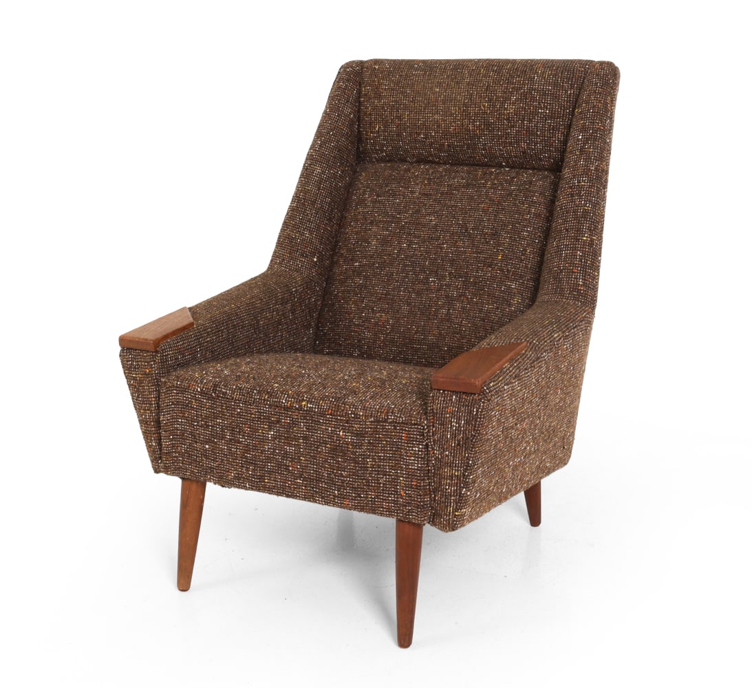KURT OSTERVIG STYLE DANISH LOUNGE CHAIR C. 1960S: Teak arms and legs. Denmark, circa 1960s. Dimensions: H 38.25" x W 29.5" x D 25" x SH 16.5". Condition: Fading to wood. Wear consistent with age and use. E140