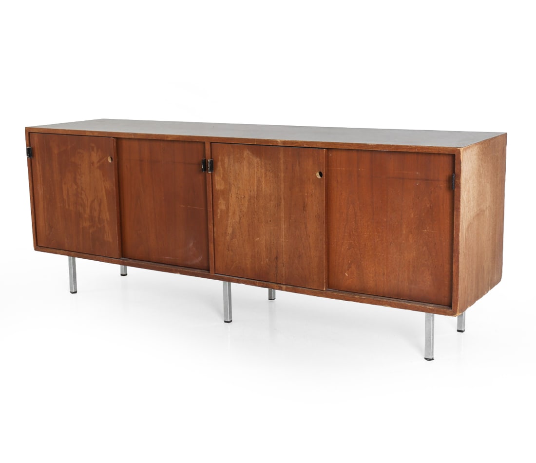FLORENCE KNOLL WALNUT SIDEBOARD C. 1960S: Apparently unmarked. Dimensions: H 27.5" x W 71.5" x D 18". Condition: For restoration, No shelves and door locks have been removed and are not included. Scuffs, scratches, fading and dings. Gouges