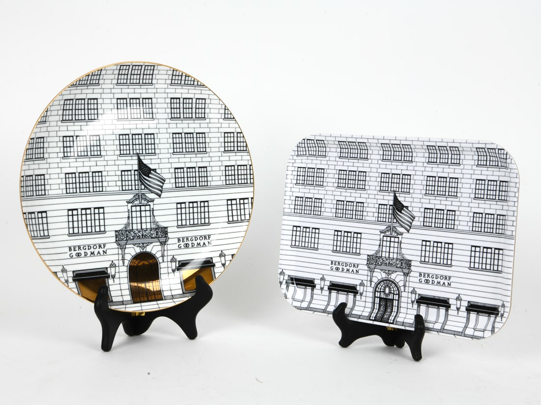 RORY DOBNER BERGDORF GOODMAN GROUPING: Grouping includes a porcelain plate with black and white illustrations on the top and a small tray with same pattern. Marked on undersides. Dimensions: (Round plate) Dia 10.5" Condition: Tray new