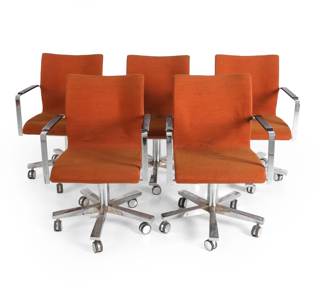 (5) ARNE JACOBSEN STYLE DANISH SWIVEL CHAIRS: Grouping of (5) swivel chairs in chrome steel frames with orange upholstered seats. Ebonized wooden accents to arms. Denmark, late 20th century. Dimensions: H 34" x W 21.5" x D 19.5" x SH 13.5". Condi
