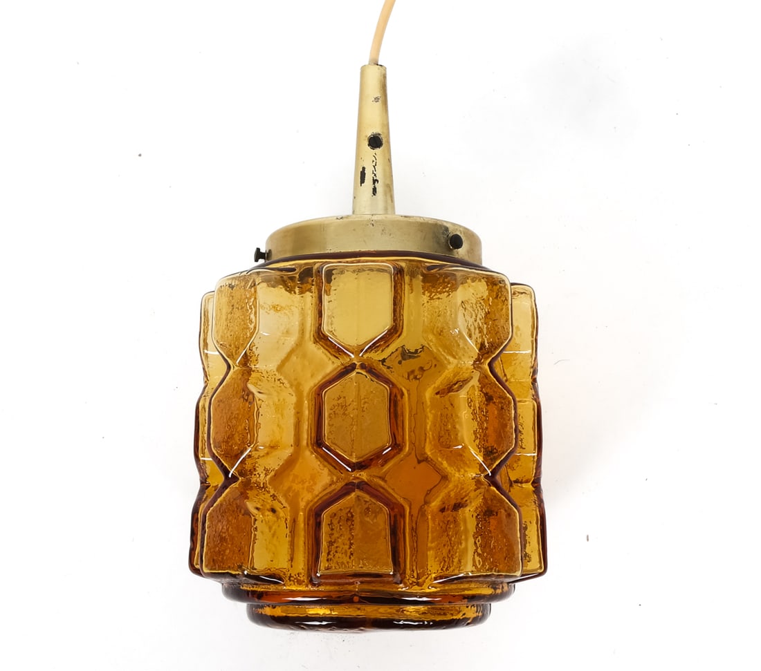 ATTR. VITRIKA DANISH GLASS & BRASS PENDANT LIGHT: Amber glass shade and brass fixture. Denmark, circa 1960s. Dimensions: H 12" x Dia.6 " Condition: Not tested, Wear consistent with age and use, including scratches. Patina and discoloration to brass.