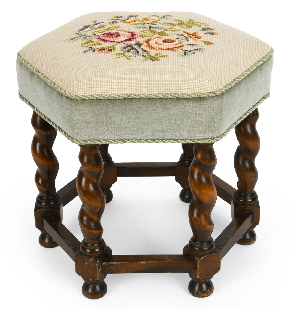 DANISH TURNED BEECH STOOL C. 1960S: Small ottoman stool with beech barley twist legs and needlework design to top. Green cord to outer rim. Denmark, circa 1960s. Dimensions: H 14.75" x Dia. 14". Condition: Scuffs and scratches to legs. 