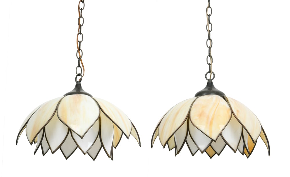 PAIR STYLE SLAG GLASS LOTUS PENDANT LAMPS: (2) Pendant lights with tulip-shaped shades of honey-colored glass panels. Top tier of shade rests freely upon lower shade. Mid 20th century. Dimensions: H 12.5" x Dia. 15". Condition: Wiring untested