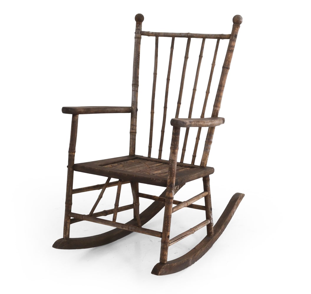 19TH C. ANTIQUE OAK AND BAMBOO ROCKING CHAIR: Oak rocking chair with bamboo-turned design. Faint painted decoration. Circa 19th century. Dimensions: H 39" x W 22.75" x D 34" x SH 17". Condition: Painted finish mostly worn away. Scratches and few 