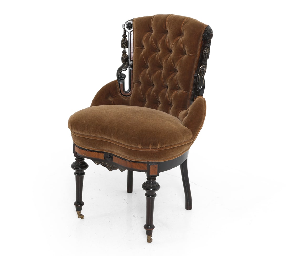 JOHN JELLIFF STYLE WALNUT & VELOUR PARLOR CHAIR: Walnut parlor chair with arched back and deep button-tufted brown velour upholstery. Painted decoration with walnut accents to frame. Turned legs and carved apron. 19th century. Dimensions: H 36.5" x