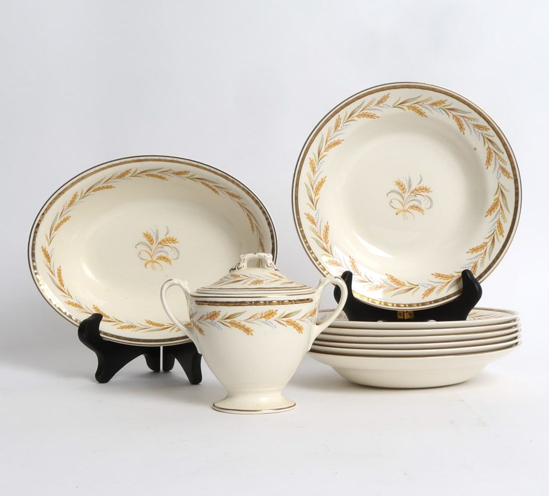 HOMER LAUGHLIN PORCELAIN GROUPING: Marked underneath. Including: (7) soup bowl, salad bowl, sugar bowl. Dimensions: (Largest) Dia 8.45" Condition: Wear consistent with age and use. No issues to note.