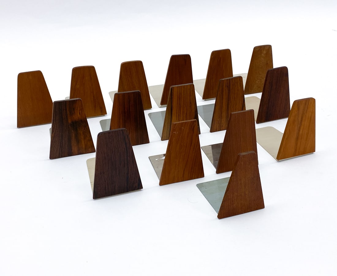 KAI KRISTIANSEN DANISH BOOKEND GROUPING: (16) Total, includes rosewood and teak. Dimensions: H 5.25" x W 3.75" x D 5.75" Condition: Rubs, scratches, wear consistent with age and use.