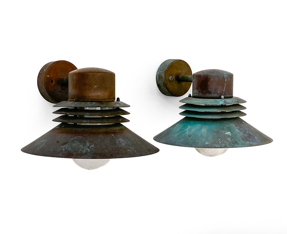 PAIR OF FORM-LIGHT DANISH COPPER OUTDOOR SCONCES: Label on mount. Dimensions: H 9" x W 11.5" x D 11" Condition: Not tested, Patina to shade and stem, wear consistent with age and use.
