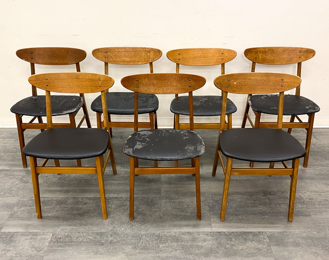 (7) FARSTRUP TEAK DINING CHAIRS FOR REUPHOLSTERY: Marked underneath one chair. Denmark, circa 1960s. Dimensions: H 31" x W 19" x D 16" x SH 19" Condition: Wear consistent with age and use. Could use reupholstery. Scuffs, fading.