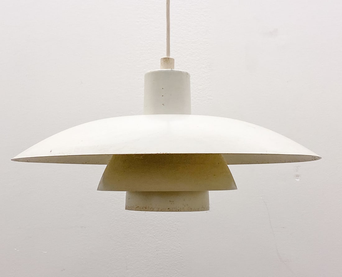 POUL HENNINGSEN LOUIS POULSEN PH 4/3 PENDANT LIGHT: In painted aluminum. Marked to inside the socket. Denmark, circa 1970s. Dimensions: H 7" x Dia 16" Condition: Wear consistent with age and use. Untested. Soiling to rims.