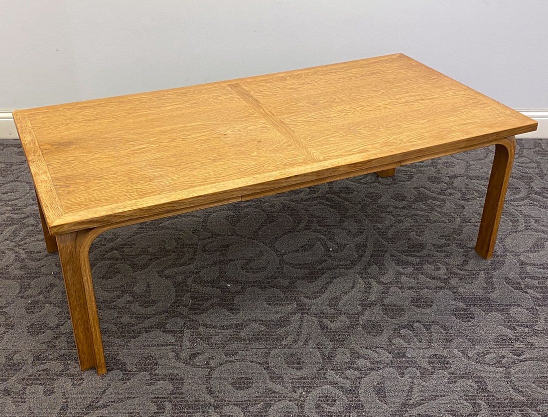THYGESEN & SORENSEN MAGNUS OLESEN OAK COFFEE TABLE: Designed by Rud Thygesen & Johnny Sorensen for Magnus Olesen. Oak and beech frame. Apparently unmarked. Denmark, 20th century. Dimensions: H 18.5" x W 53.5" x D 27.5" Condition: Wear consistent with a