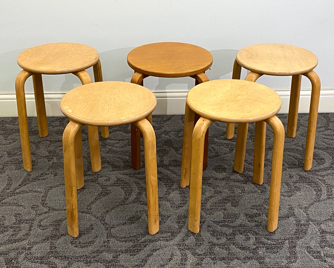 (5) STYLE OF ALVAR AALTO SCANDINAVIAN STOOLS: Oak, birch and beech. 20th century. Dimension: H 18" x Dia. 16" Condition: Wear consistent with age and use including dings and rubs to legs and seat.