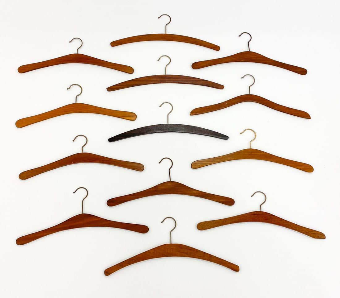 DANISH TEAK & ROSEWOOD HANGERS GROUPING: (13) Total. Dimensions: H 5" x W 18" Condition: Wear consistent with age and use including dings, scratches, surface marks.