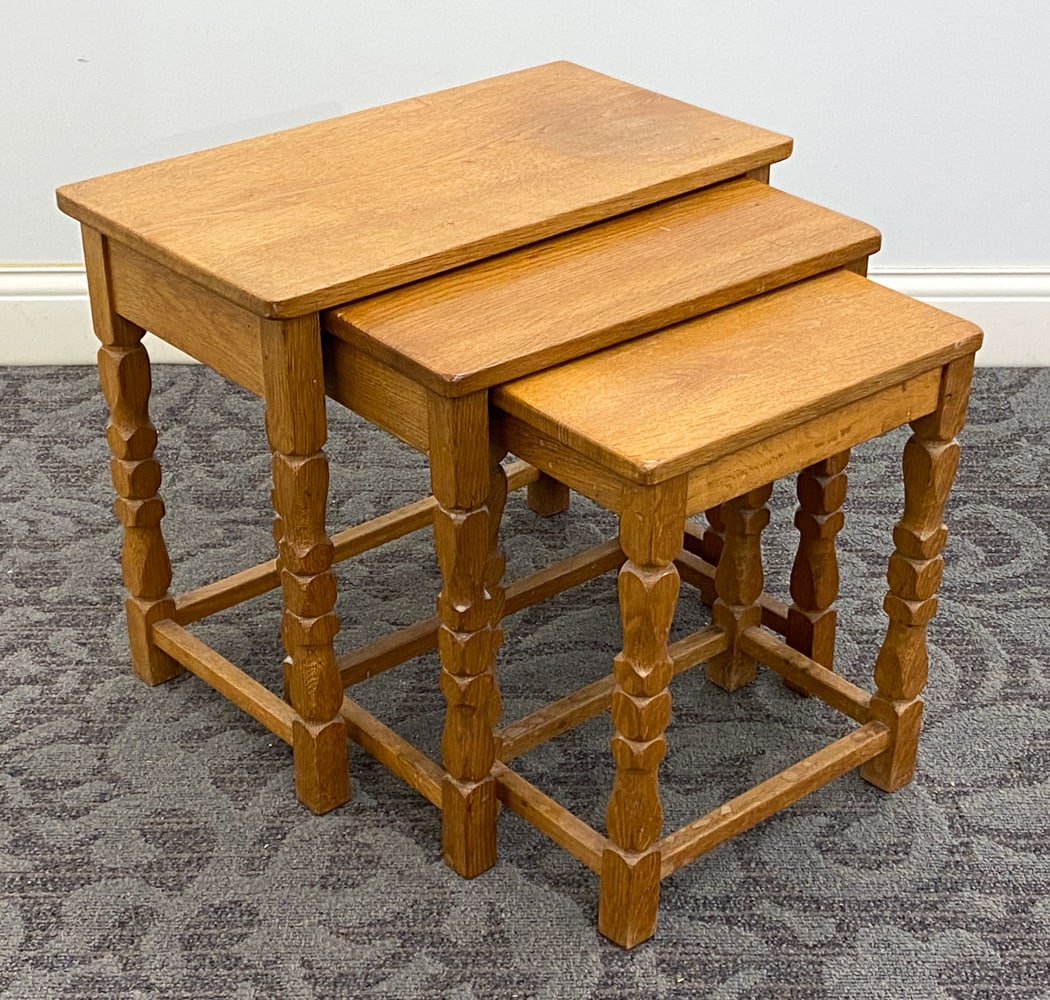 STYLE OF KJAERNULF DANISH OAK NESTING TABLES 1970S: (3) Tables. Unmarked. Dimensions: H 19.5" x W 23" x D 12.75" Condition: Wear consistent with age and use including minor rubs and scuffs.
