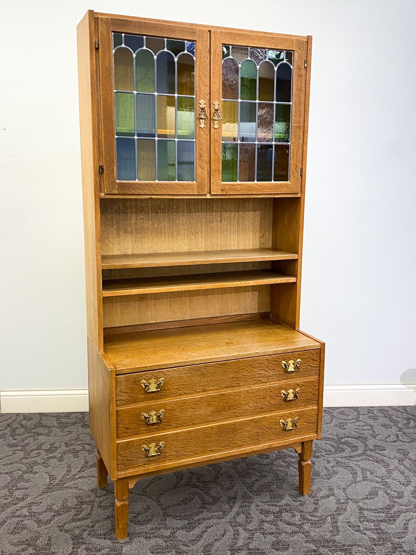 KJAERNULF STYLE DANISH OAK & STAINED GLASS CABINET: Denmark, circa 1960s. Dimensions: H 70.5" x W 33" x D 17" Condition: Wear consistent with age and use including minor rubs and scuffs to top and sides.