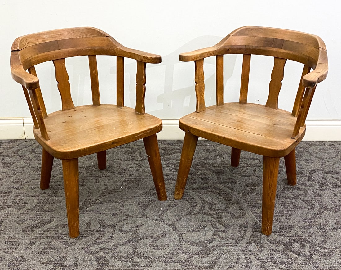 PAIR OF KROGENAES NORWEGIAN PINE ARMCHAIRS 1960S: Apparently unmarked. Norway, circa 1960s. Dimensions: H 28.25" x W 24" x D 20" x Sh 15.5" Condition: Stress cracks to backrest and seat to both chairs, Sun-fading to surface, Minor dings and rubs to b