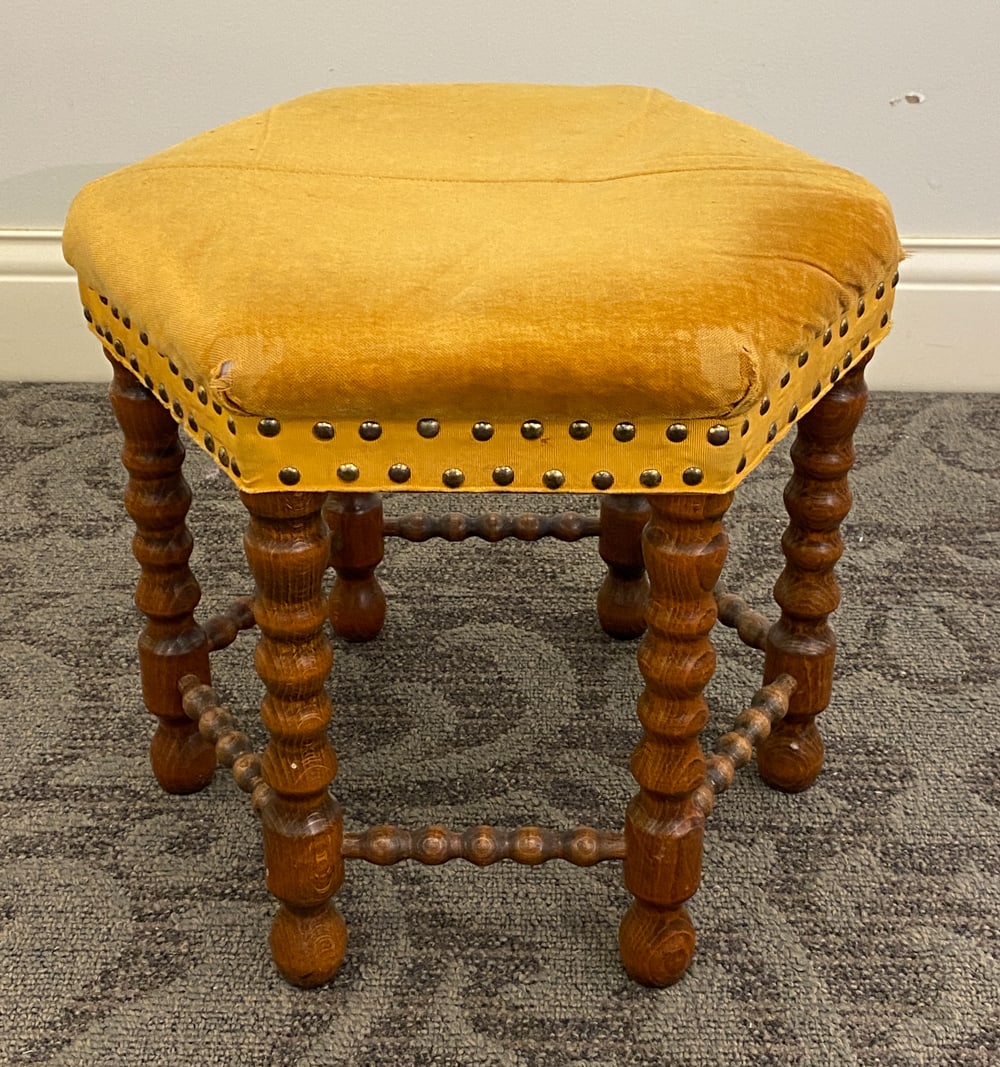 SCANDINAVIAN OAK STOOL C. 1930S: Oak bobbin turned legs. Scandinavian, circa 1930s. Dimension: H 14.5" x W 16" x D 14.5" Condition: Discoloration. Tears to corner of seat. Wear consistent with age and use.