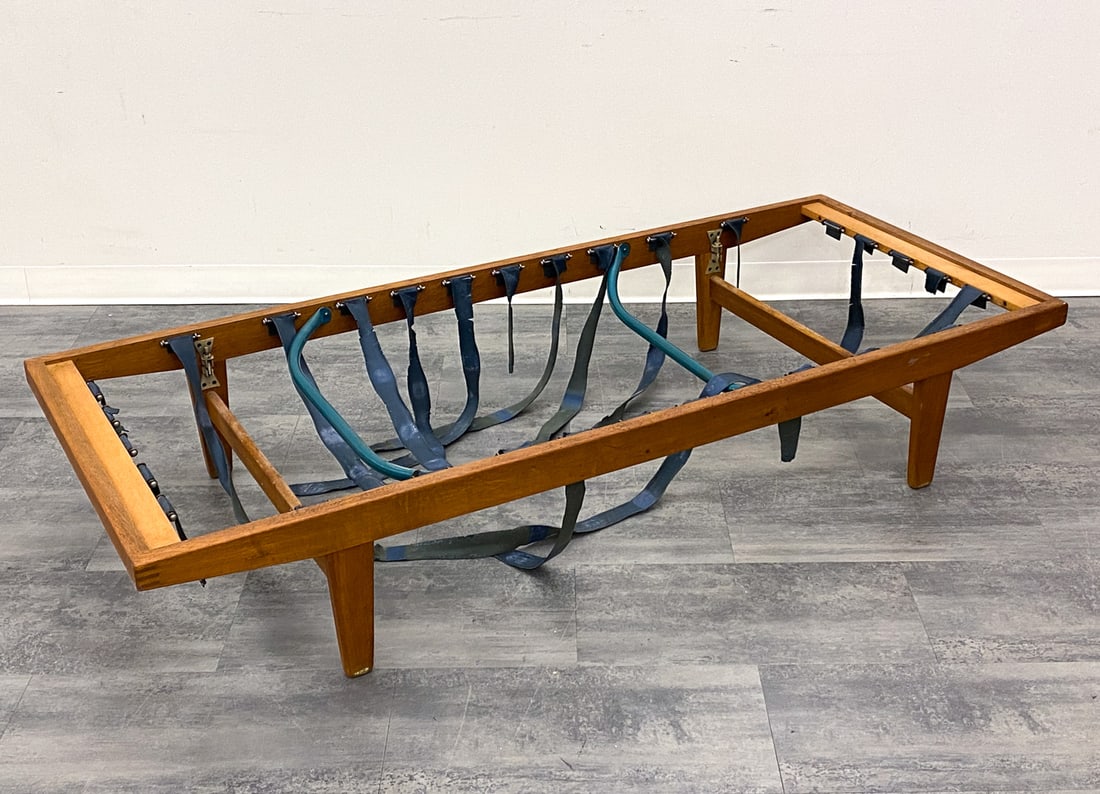 POUL VOLTHER FOR FDB DANISH TEAK DAYBED FRAME: Marked to frame. Denmark, circa 1960s. Dimensions: H 13.5" x W 55" x D 31.5" Condition: Wear consistent with age and use. Rubber straps are torn or missing.