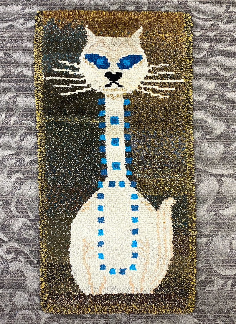 DANISH CAT RYA RUG: Apparently unmarked. Dimensions: H 45.5" x W 23.5" Condition: Light surface wear consistent with age and use.