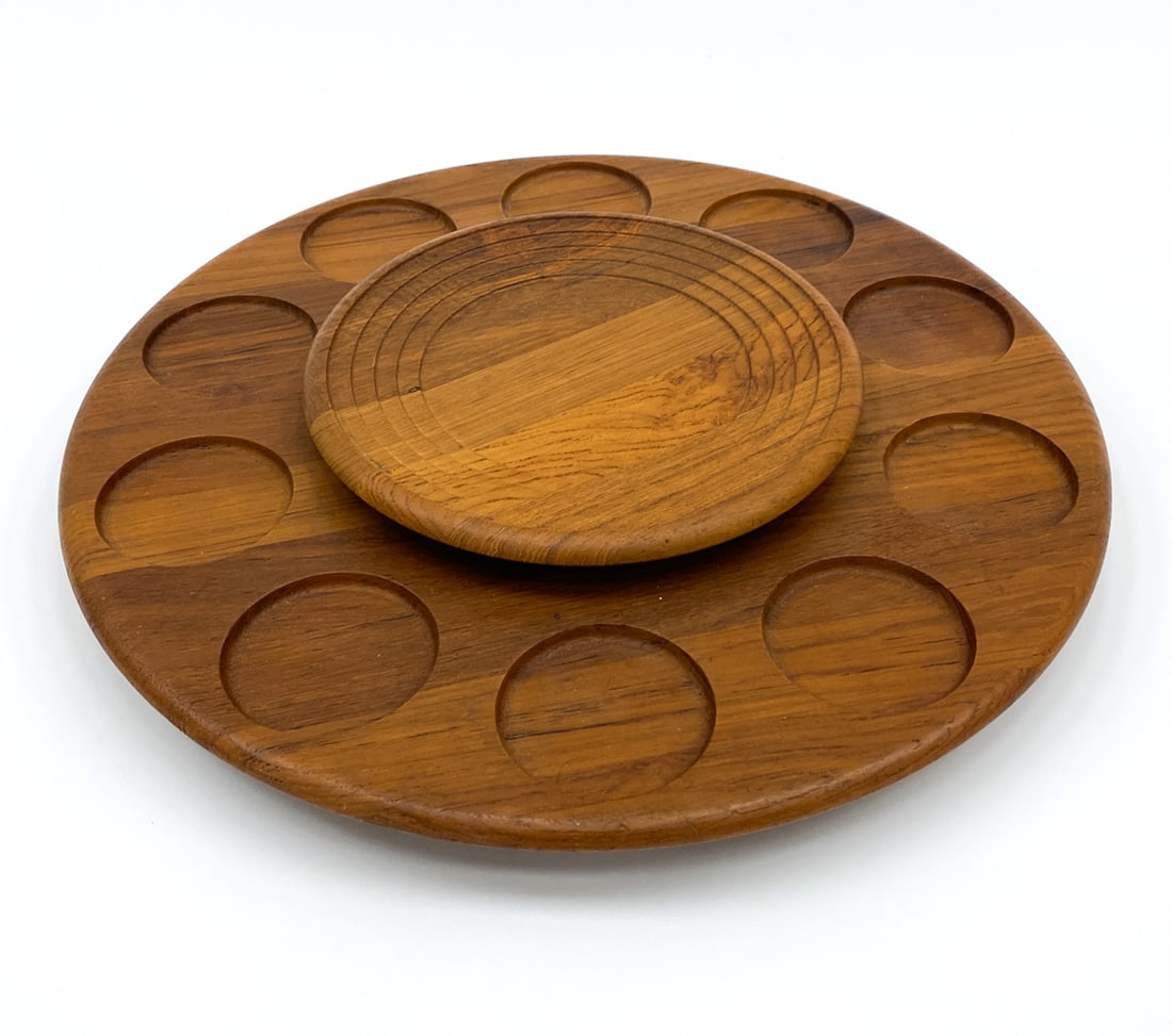 DIGSMED DANISH TEAK LAZY SUSAN TRAY C. 1960S: Marked underneath. Denmark, circa 1960s. Dimensions: H 3" x Dia 19" Condition: Wear consistent with age and use. Minor scuffs to bottom.