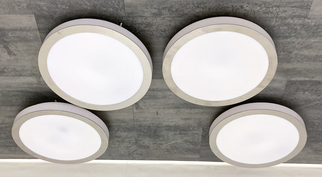 LOUIS POULSEN MODEL 32281 DANISH CEILING LIGHTS: (4) Lights. Marked to fixture under the glass. Denmark. Dimensions: H 3.5" x Dia 16" Condition: Wear consistent with age and use. Untested