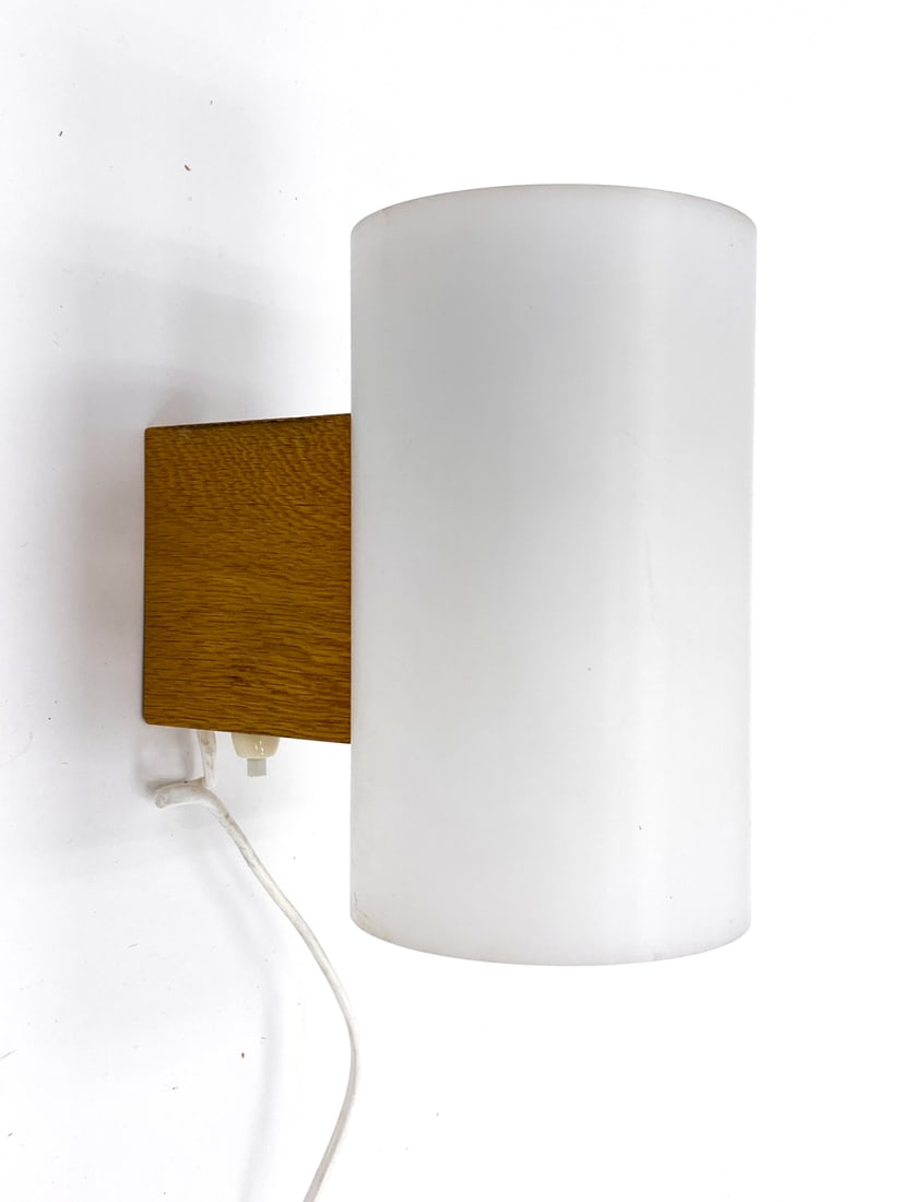 UNO & OSTEN KRISTIANSSON FOR LUXUS VITTSJO SCONCE: Labeled. Sweden, circa 1960s. Dimensions: H 6.75" x W 4" x D 7.5" Condition: Untested. Dings to mount. Wear consistent with age and use.