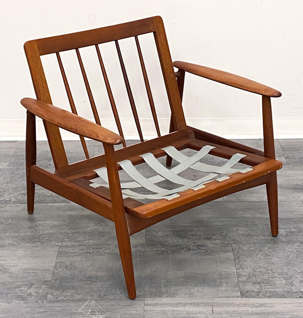 WEGNER STYLE DANISH TEAK LOUNGE CHAIR FRAME: Unmarked. Dimensions: H 26" x W 29.75" x D 27" x SH 12.5" Condition: Lacking cushions.