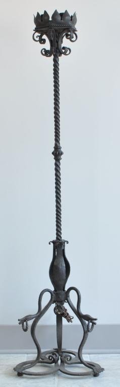 ARTS & CRAFTS WROUGHT IRON TORCHIERE LAMP: Wrought Iron Torchiere lamp in the manner of SAMUEL YELLIN. Tri-footed base with dragon or snake design. Three candled top has been electrified. Unsigned. From a Weston, CT Collection Dimensions: 62" 