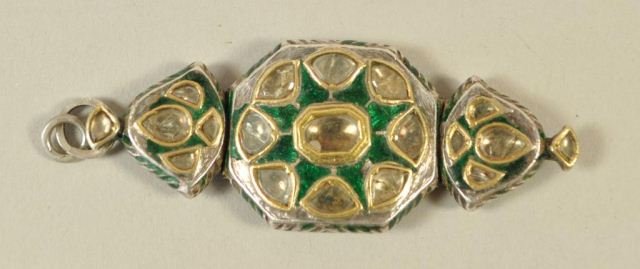 ENAMELED SILVER BRACELET W/ INSET STONES: Part of a antique silver and enamel bracelet with inset stones. Enameling on both sides. Made into a pendent missing the chain. Dimensions: 3.5" X 1.25"