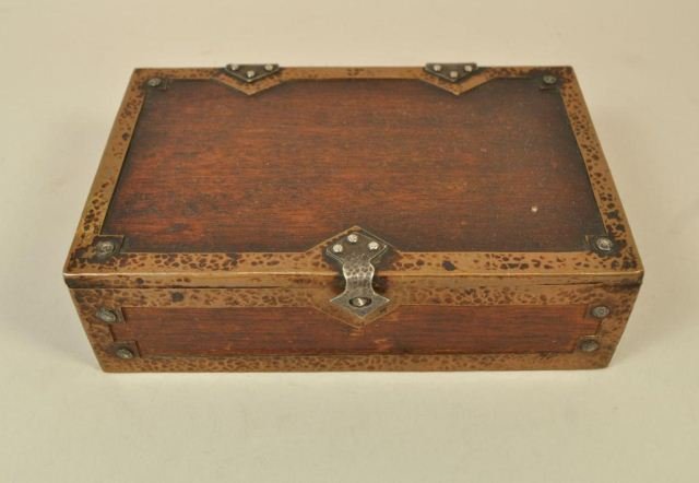 ARTS AND CRAFTS BOX ATTR. TO JOSEPH HEINRICH: Arts and Crafts hammered copper and silver wooden box. Dimensions: 2.5" H X 8.75" W X 5.5" D