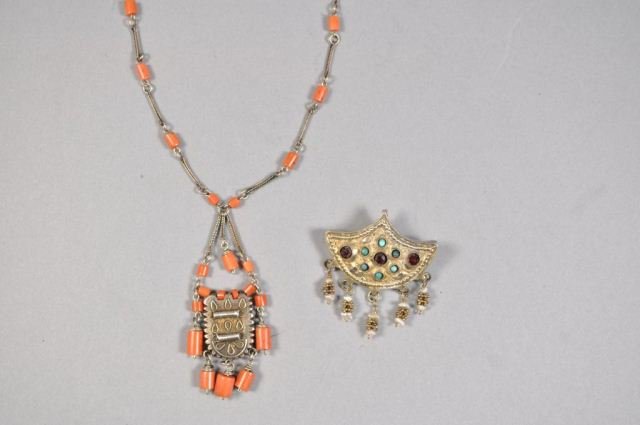MIDDLE EASTERN SILVER & CORAL ETC JEWELRY: Middle Eastern silver jewelry with coral, turquoise, pearl and stone accents. In good, wearable condition. Necklace measures: 11.5" Pin measures: 2" long