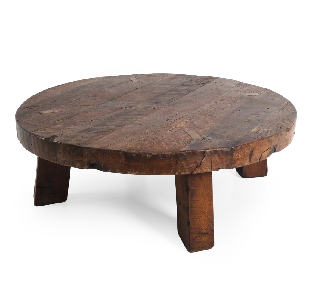 SCANDINAVIAN BRUTALIST OAK COFFEE TABLE C. 1960S: Dimensions: H 19.75" x Dia. 55". Condition: Scuffs, rubs, few small stress cracks to sides. Wear consistent with age and use. PT033
