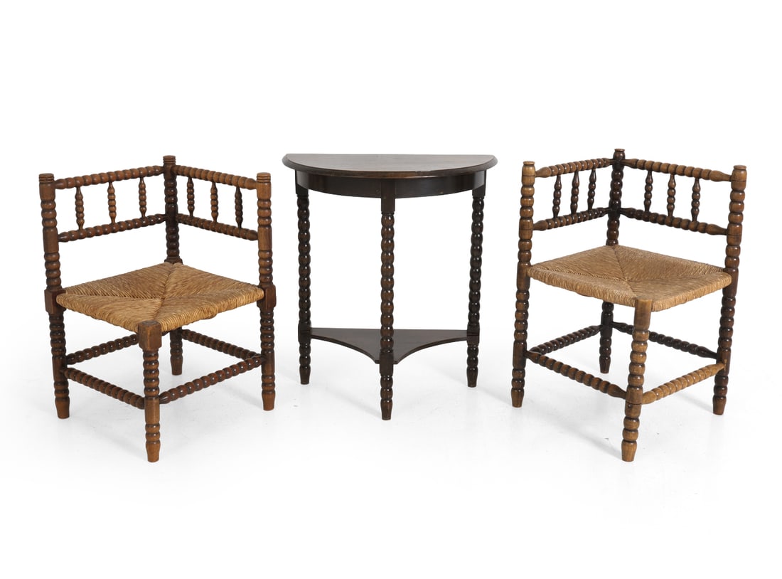 (2) DUTCH BOBBIN OAK CORNER CHAIRS & TABLE 1930S: Dimensions: Table H 27.25" x W 24.5" x D 15". Chairs H 27" x W 16" x D 16.5" Condition: Faint water rings to table top. Wear consistent with age and use, including scuffs and scratches. PT038