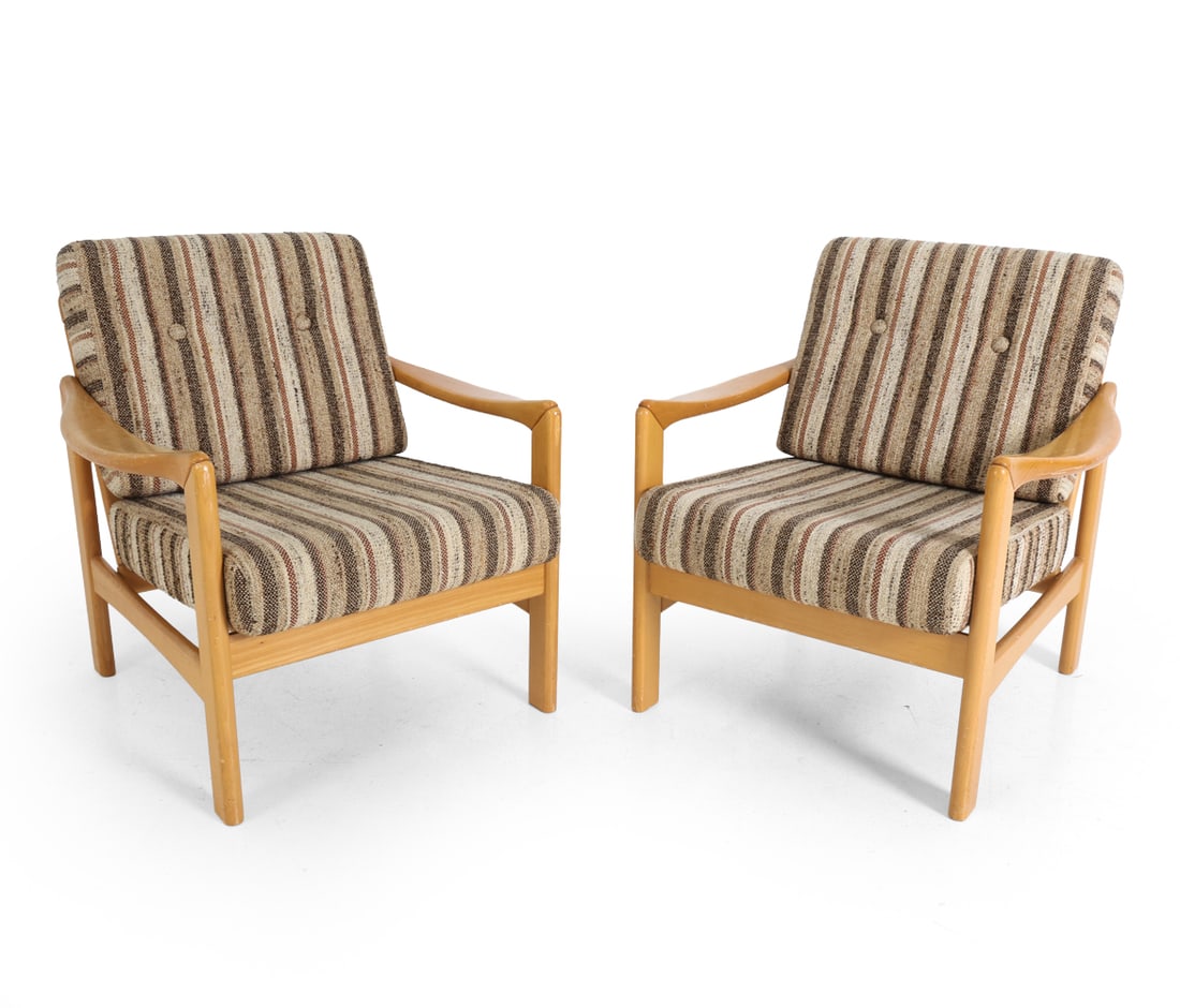 PAIR OF WALTER KNOLL "STELLA" LOUNGE CHAIRS 1960S: Beech frame. Germany, circa 1960s. Dimensions: H 31" x W 28" x D 27" x SH 17". Condition: Scuffs, scratches, and dings to frames. Water spots to frames. Wear consistent with age and use. PT145