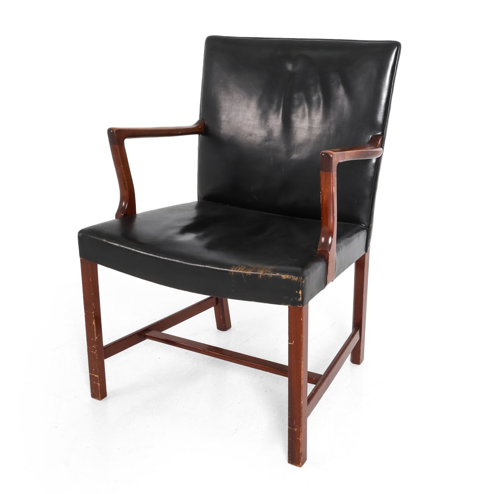 HANS WEGNER A422 DANISH LEATHER LOUNGE CHAIR 1940S: Apparently unmarked. Denmark, circa 1940s. Dimensions: H 35" x W 25" x D 20" x SH 17.25". Condition: Scuffs, scratches, and rubs to leather and wood. Wear consistent with age and use. PT054