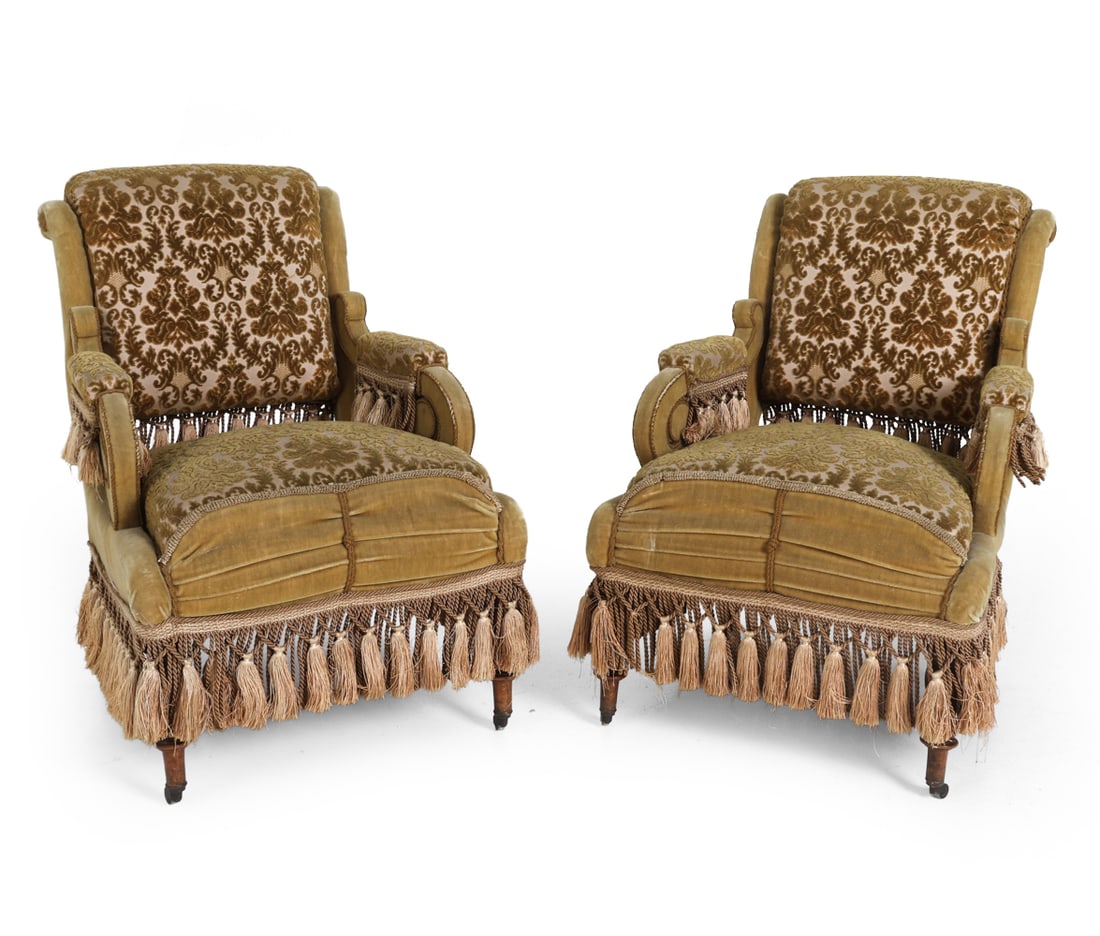 PAIR OF NAPOLEON III STYLE VELVET LOUNGE CHAIRS: Dimensions: H 31.75" x W 19.5" x D 23" x SH 17.5". Condition: Few faint discolored spots. Stress split to leg. Wear consistent with age and use. PT191