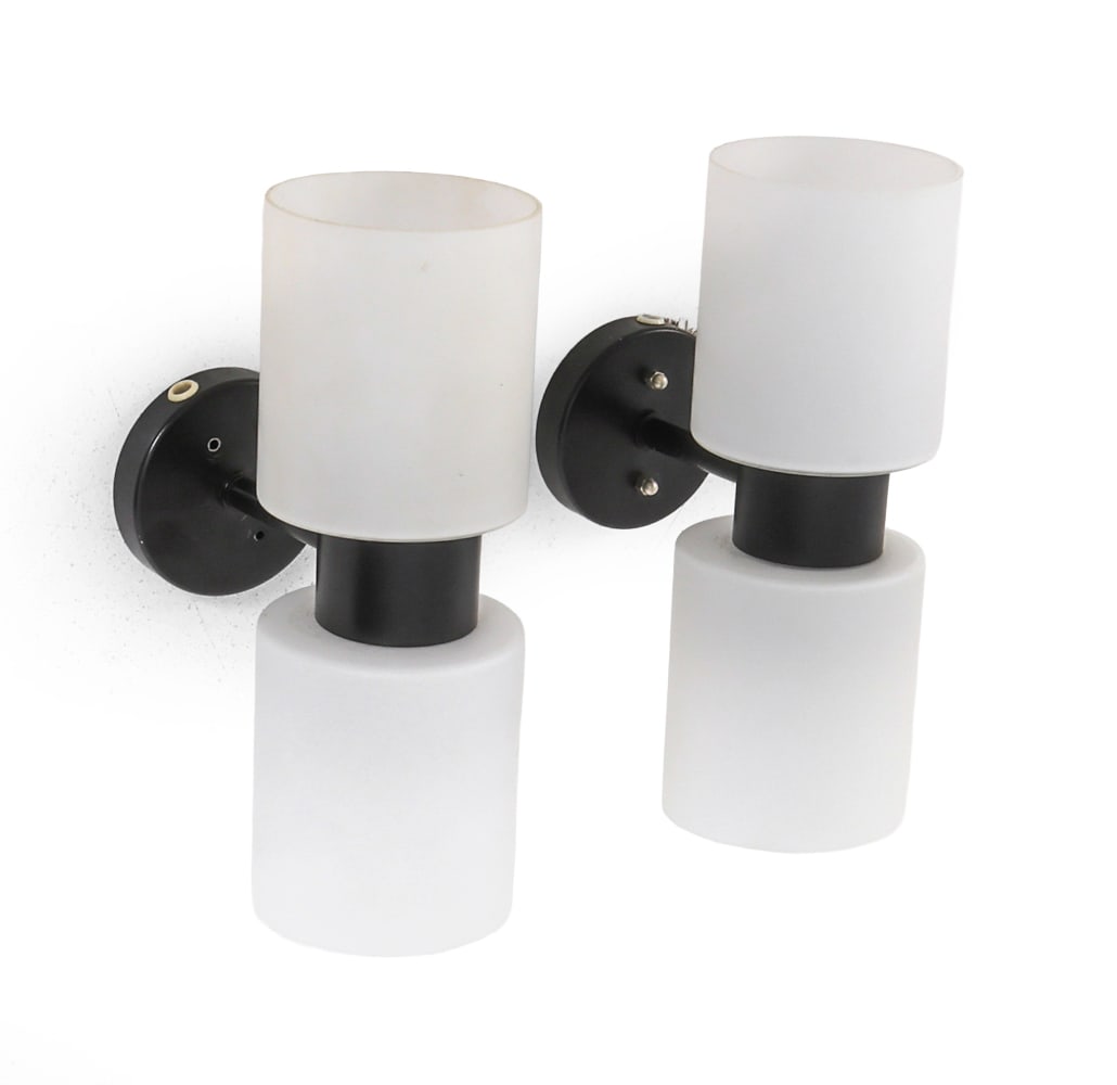 PAIR OF J. W. BOXMAN RAAK C1600 WALL SCONCES: Apparently unmarked. Netherlands, circa 1960s. Dimensions: H 4" x W 10.75" x D 4". Condition: Wiring untested. Light scuffs. Wear consistent with age and use. PT176
